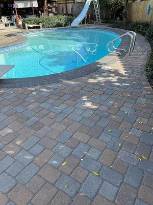 Paver repair around our pool.