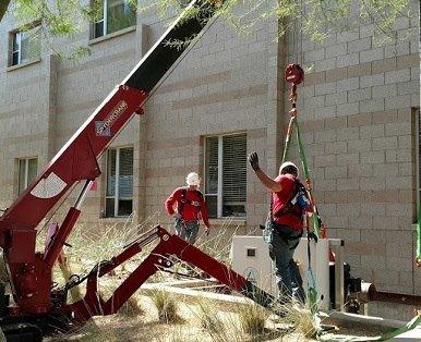 Using a spydercrane on a job at ASU