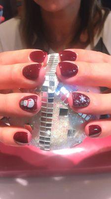 Burgundy nails with snowman design