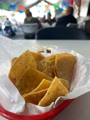 Outdoor dining and fresh chips w amazing salsa!