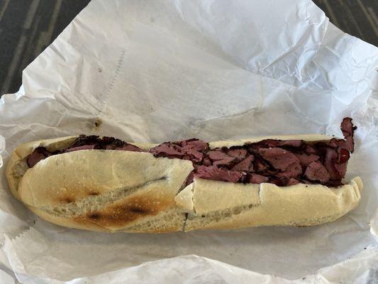 Pastrami & provolone 12" sandwich.