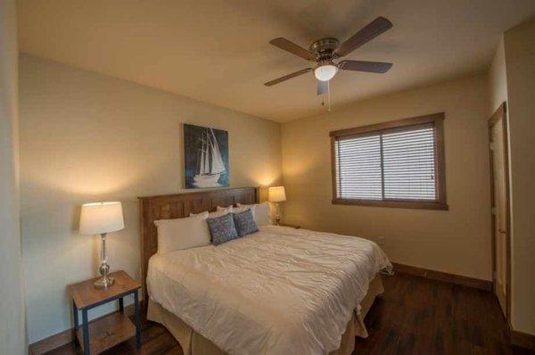 Guest bedroom with king bed and luxury bedding