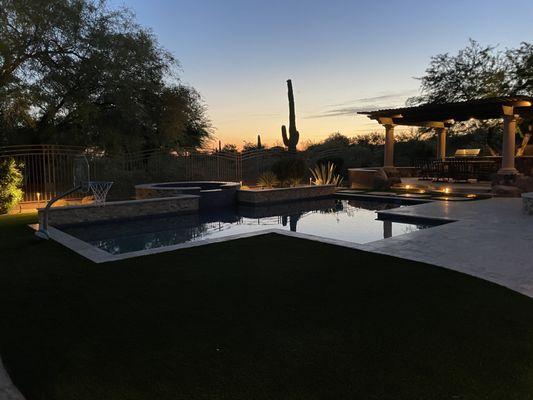 Pool with Hot Tub in the evening.