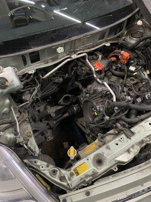 Hybrid vehicle engine repair