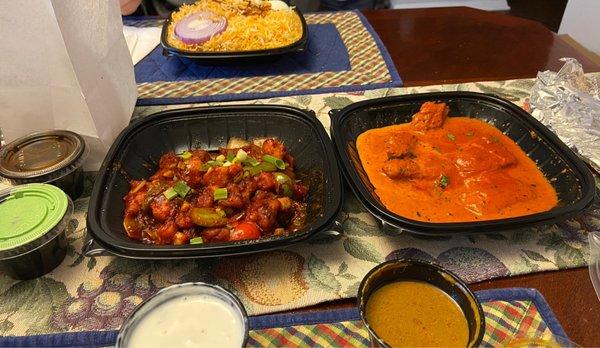 Chicken Biryani, Chile Chicken, Samosa (in the white bag), butter chicken, and garlic naan