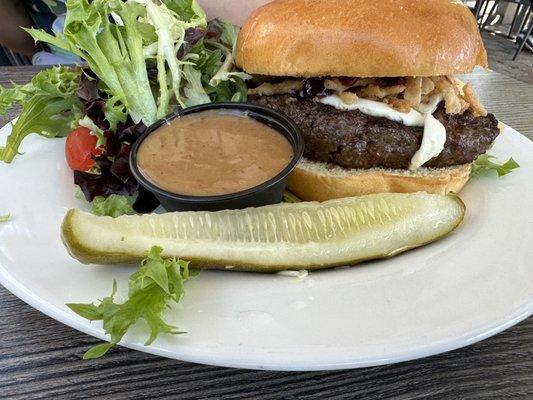 jalapeno cream cheese burger with side salad and balsamic dressing