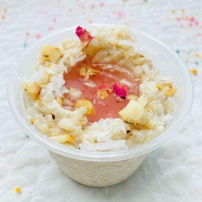 Rice Pudding (DF)- Cardamom Rice Pudding made using Coconut Milk w/ Rose Syrup, Roasted Hawaiian Mac Nuts and Shredded Coconut.