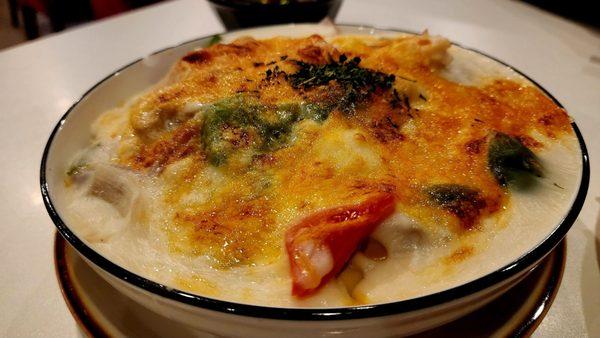 Baked seafood over rice