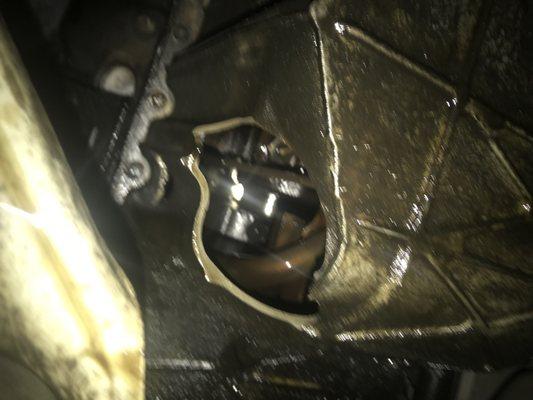 Oil pan whole from engine rod