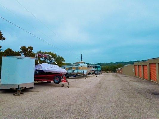 We offer large parking spaces for boats, RVs, trailers, trucks and cars.