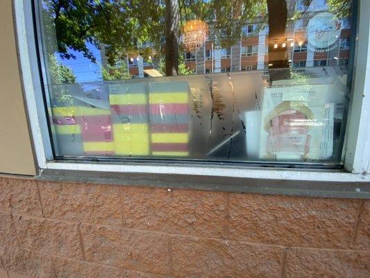 We can clean even the dirtiest windows. These windows have old glue and debris from an industrial road.