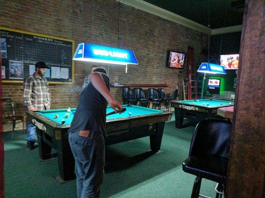 Three pool tables.