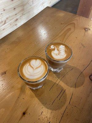 One oatmilk (left) cortado and one traditional