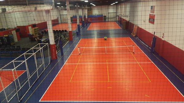 Four court view with Pickleball set up.