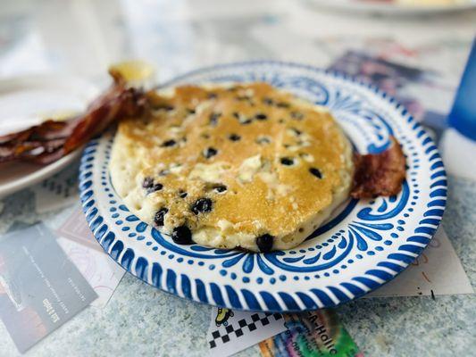 My blueberry pancake with 2 kinds of syrups.