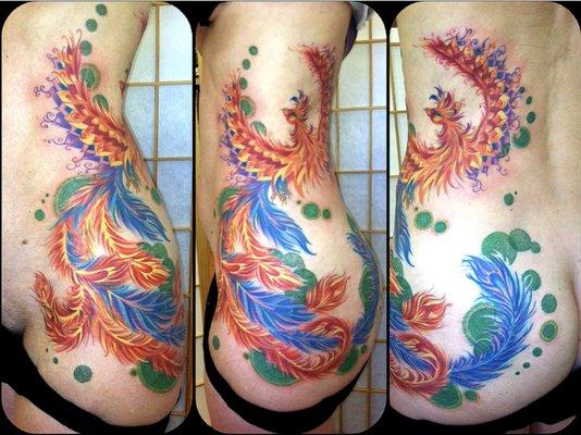 Beautiful feminine phoenix on my client's side and hip from a few years back.