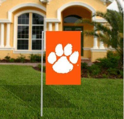 Clemson garden flags and a full Ione of other garden flags