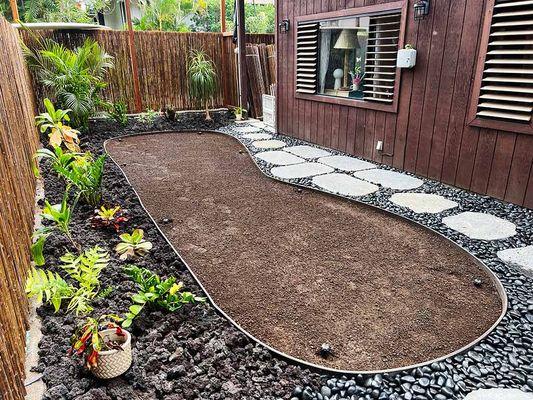 We regraded the yard, added new topsoil, and installed an irrigation system