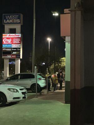 Employees ignoring the line of customers. Would rather take a smoke break .