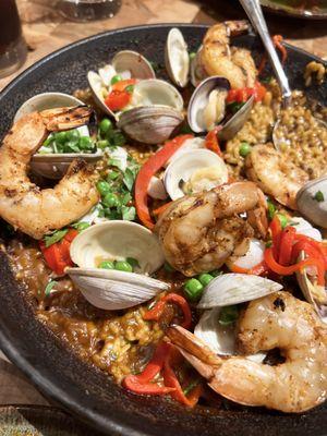 The seafood paella is delicious! It is served with lemon and a salt mixture that brings out sooo much flavor- just mix it all up!