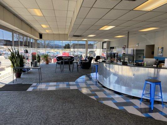 Comfortable waiting area with coffee and beverages.