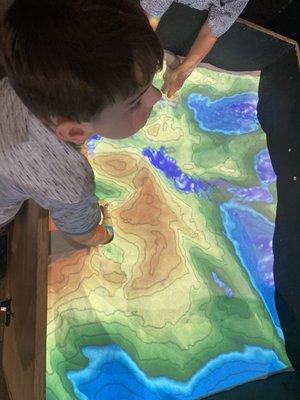 Topographic map sand exhibit