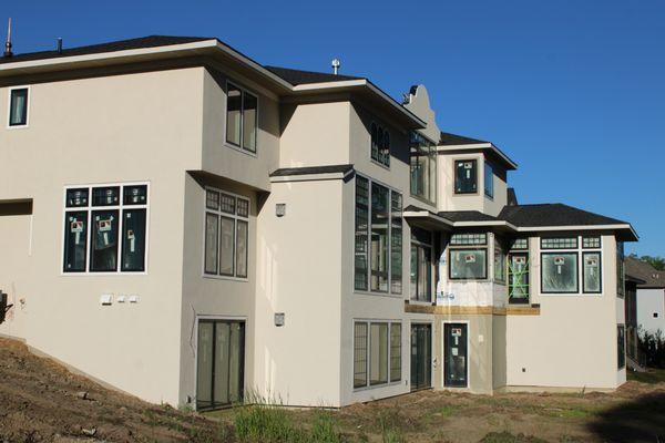 Acrylic stucco finish on a new home build.