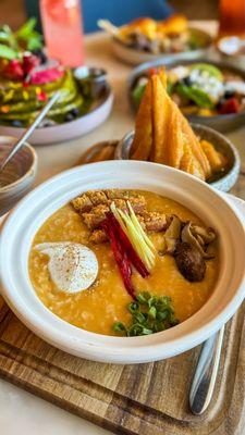 Homemade crispy pork belly porridge pair with Chinese donut(Thai Tomyum flavor ) only at Kankiin (Brunch)