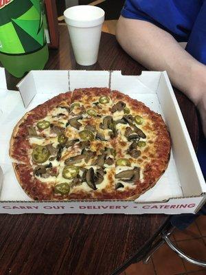 Pepperoni, mushroom and jalapeño.  Always good.