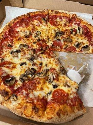 Pepperoni and mushrooms.  Fresh mushrooms preferred over canned mushrooms.