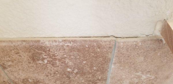 Counter tile pulling away from wall