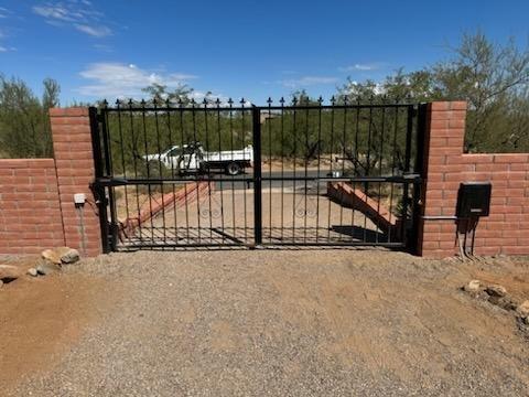 Front gates with side walls.