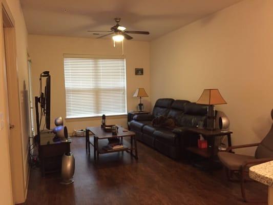 Large living room with beautiful wood floors