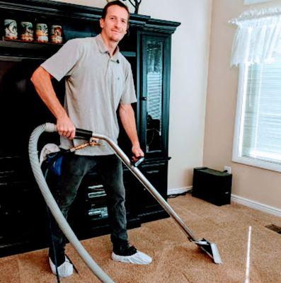 Andrew performing his magic on the  clean carpets.