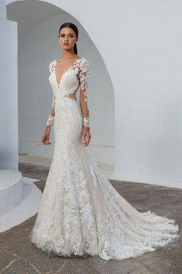 Lace fit n flare wedding dress with illusion sleeves from Justin Alexander.