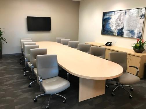 Large conference room, sanitized before and after each meeting per CDC