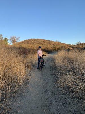 Happy new biking kid on his expertly  tuned up bike!