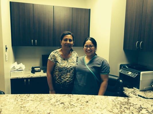 Dr. Emam and receptionist at the reception area.