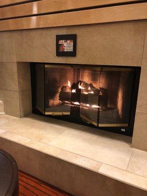 Fireplace in lounge area.