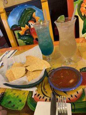 A blue margarita and a Cabo Wabo with some chips and salsa.