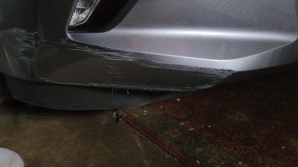 Bumper damage from ZIPS car wash in Fayetteville, AR