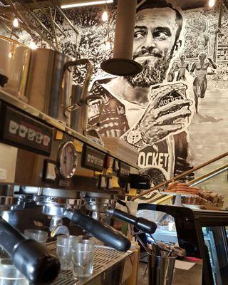 Clean and sparkling espresso bar with beautiful mural