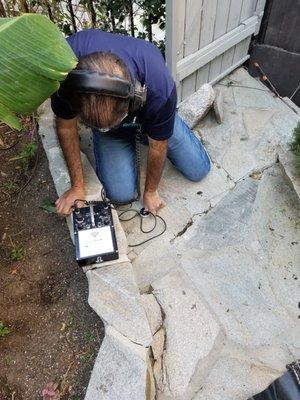 TWB searching for a burst irrigation line under the backyard cement. Home in Santa Clarita, Ca.