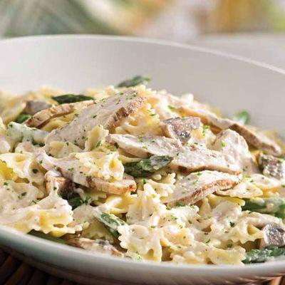 Jerk Chicken Pasta - Sliced jerk chicken breast, fresh asparagus and mushrooms tossed in a Parmesan cream sauce with bow-tie pasta.