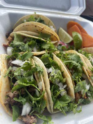 Half steak and half chicken taco order.