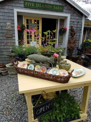 Handcrafted pottery and garden accents at Five Islands Farm.