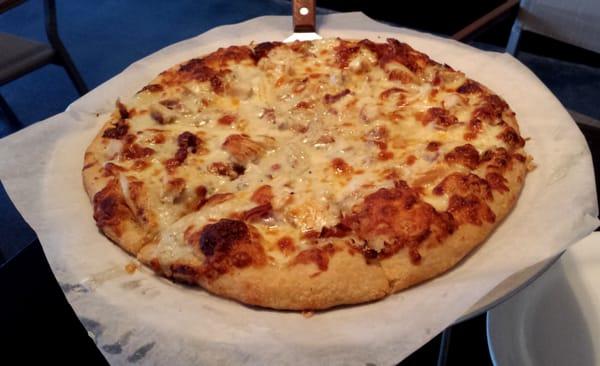 BBQ chicken pizza with blue cheese base.