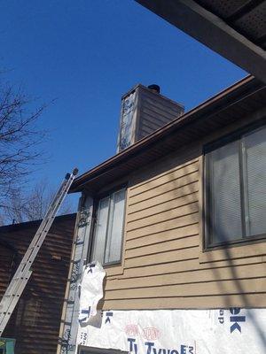 Demo, old siding, and new siding.