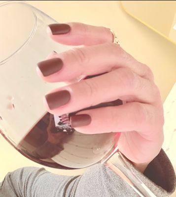 Matte top coat with glass of wine.