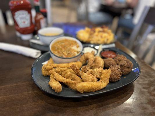 Louisiana Platter with loaded fries and some Cajun cream sauce